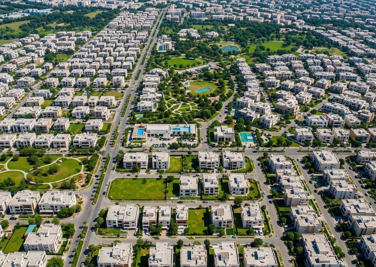 Aerial view of Faisal Town Phase 2 Islamabad showing residential plots and green spaces, symbolizing a prime real estate investment opportunity.